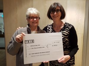 VBA Secretary Kim Frazer (right) presenting the cheque on behalf of TBIB to Rosemary Hare